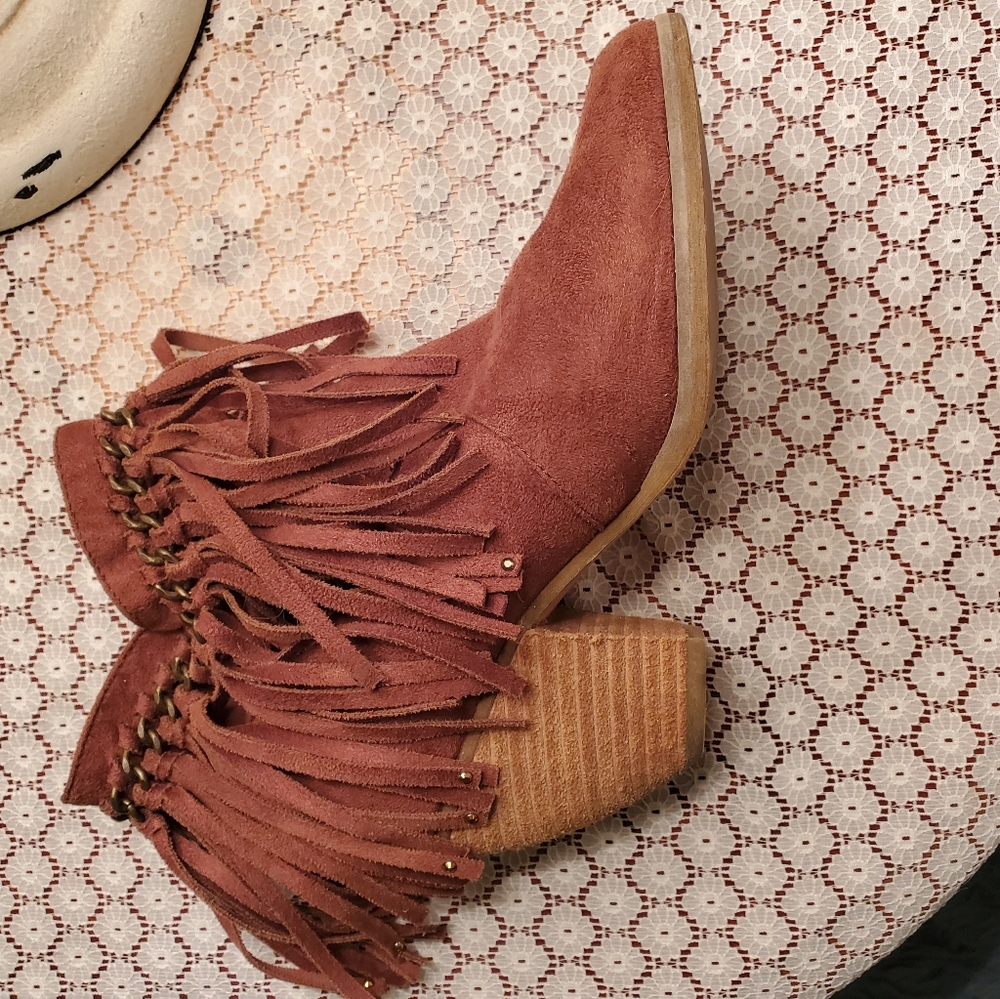 Cute ankle booties with side zip  and rhinestone embellished fringe!